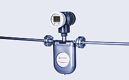 The image shows an Anton Paar L-Cor 8000 Coriolis flow meter, a high-precision inline instrument used for measuring fluid properties directly in industrial processes.