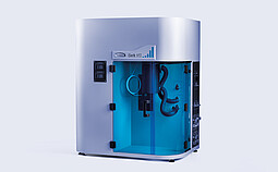 High-pressure volumetric gas sorption analyzer iSorb HP2 by Anton Paar, featuring a sleek silver design with a transparent blue-front chamber, internal tubing, and precision components visible inside. The device includes control panels and ports for gas adsorption measurements, designed for high-pressure gas storage and separation analysis.